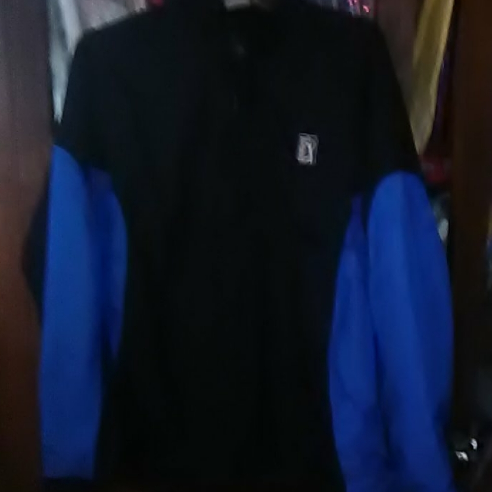 Blue and black golf windbreaker